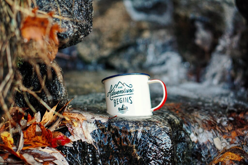 outdoor adventure mug on rocks outdoor adventure mug on rocks