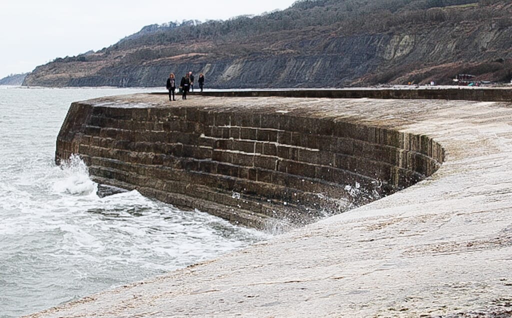 Things-to-do-in-lyme-regis: walking on the cobb Things-to-do-in-lyme-regis: walking on the cobb