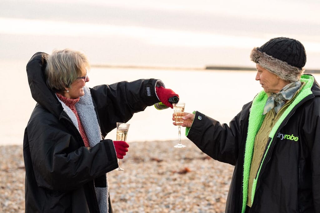 Things-to-do-in-lyme-regis drinking LBW fizz on beach Things-to-do-in-lyme-regis drinking LBW fizz on beach
