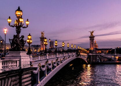 paris bridge as sun sets