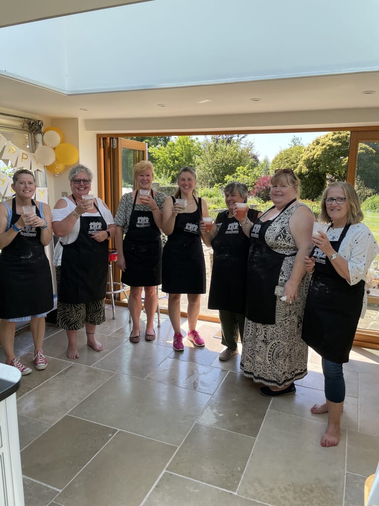The Old Bakehouse Cookery Classes in the Cotswolds - group of girls with cocktails