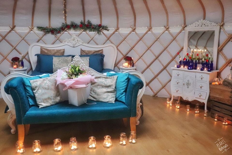 Peake's Retreat Yurts - inside sofa and candles