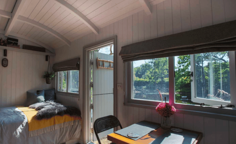The Hide Shepherds Hut in Cuckfield, Sussex - table and view