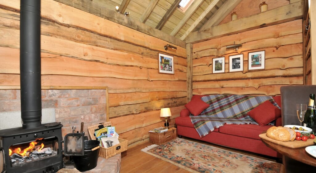 Copperbeech Bowtop Log Cabin and Gypsy Caravan, inside cabin lounge Copperbeech Bowtop Log Cabin and Gypsy Caravan, inside cabin lounge