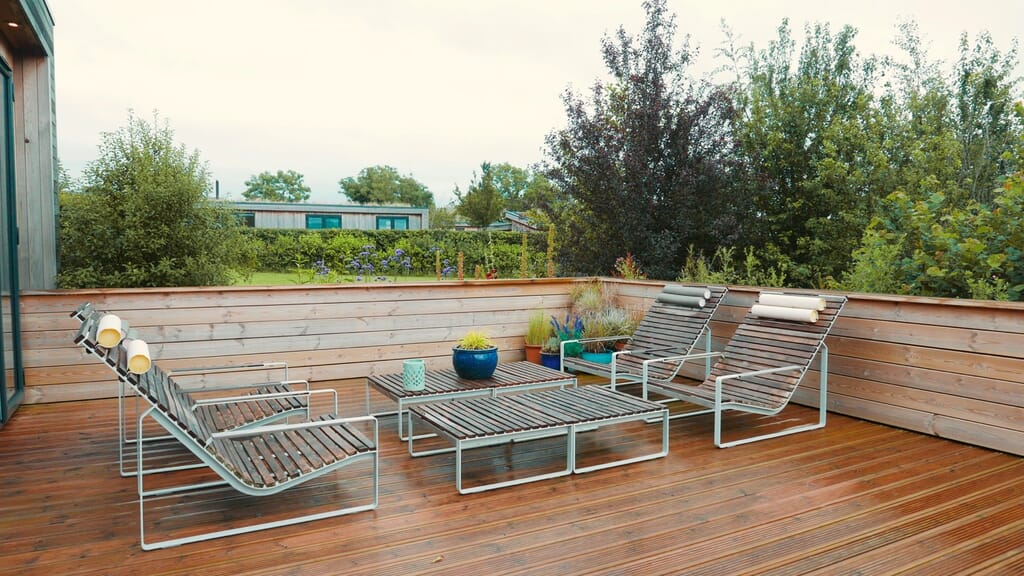 Strawberryfield Eco Lodges in Somerset - deck and loungers Strawberryfield Eco Lodges in Somerset - deck and loungers