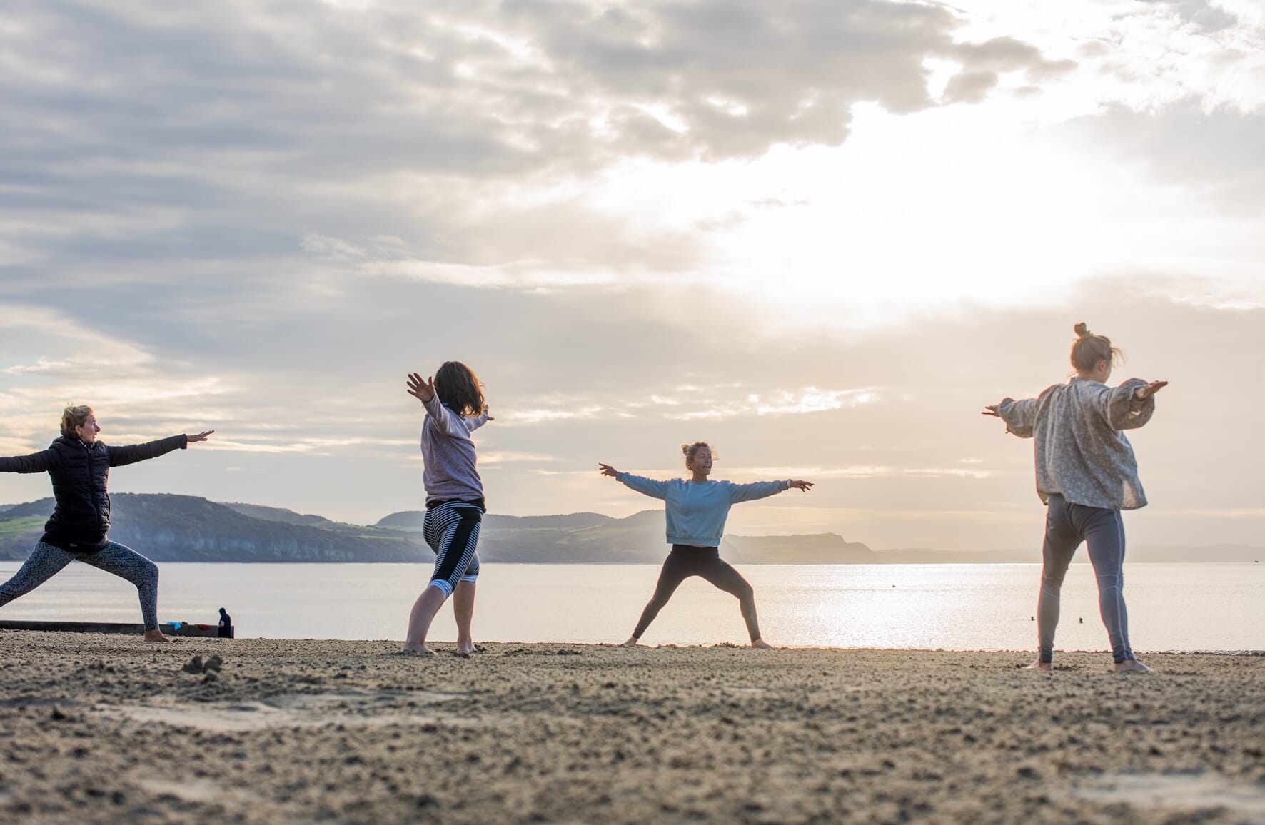 yoga with pip from Maitri Yoga on Lyme Regis beach