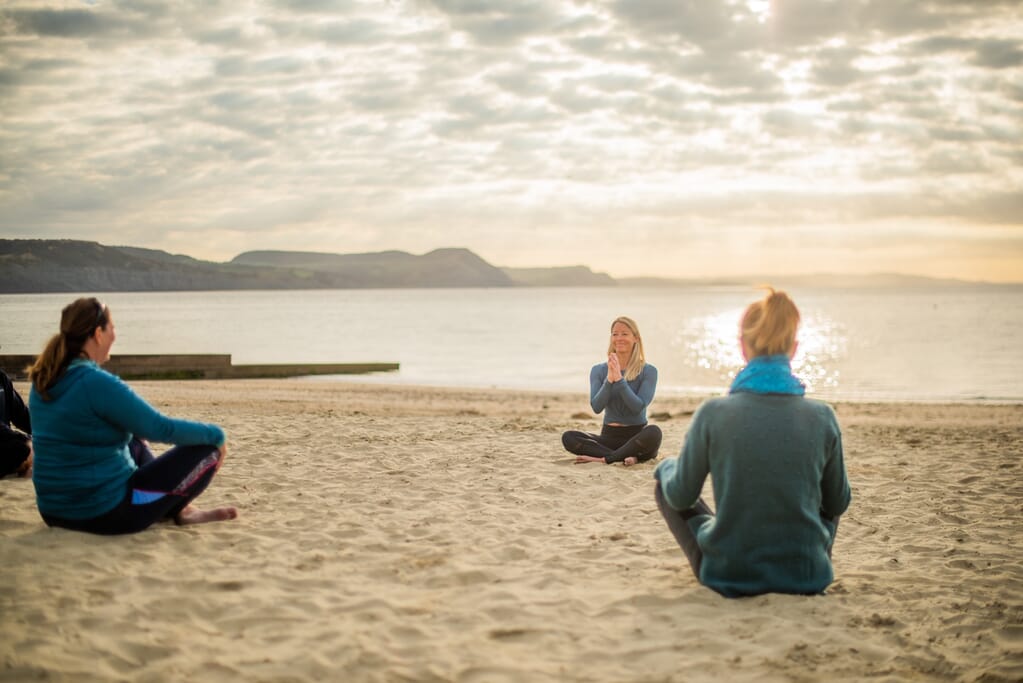 yoga with pip from Maitri Yoga on Lyme Regis beach yoga with pip from Maitri Yoga on Lyme Regis beach