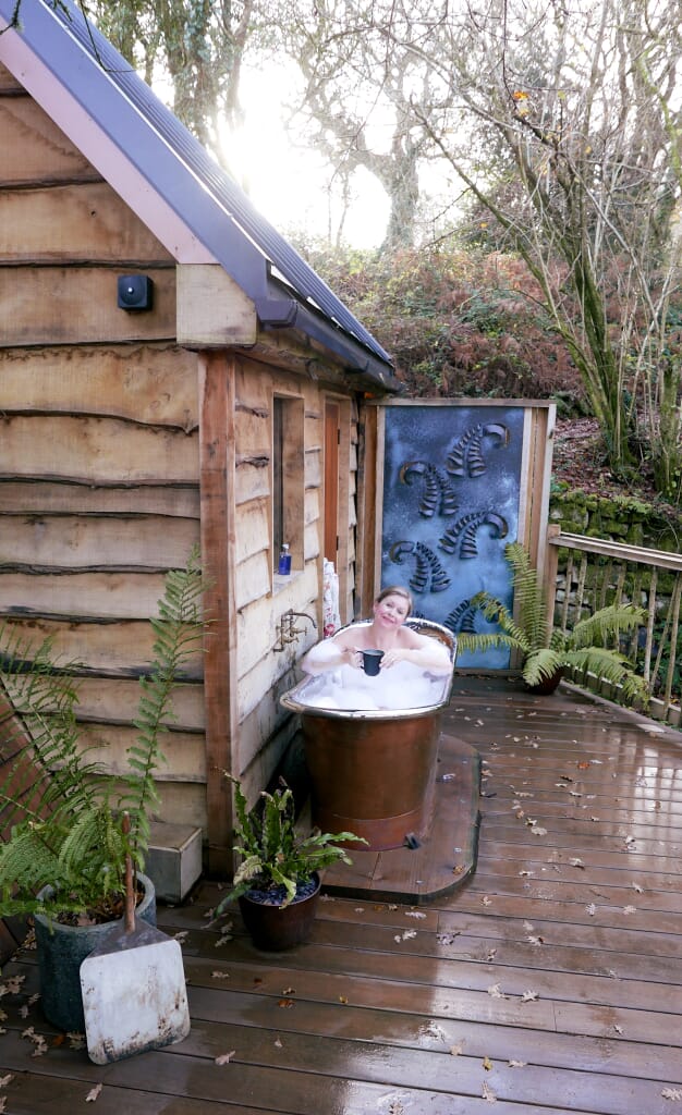Hudnalls Hideout - treehouse to stay in, Wye Valley. Copper bath tub on decking Hudnalls Hideout - treehouse to stay in, Wye Valley. Copper bath tub on decking