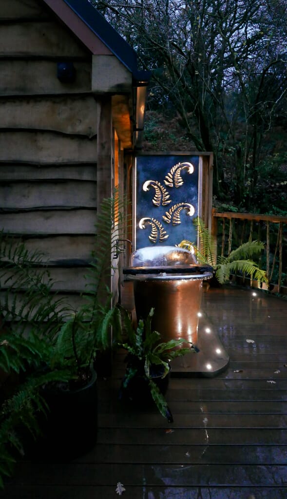 Hudnalls Hideout - treehouse to stay in, Wye Valley. Copper bath tub on decking Hudnalls Hideout - treehouse to stay in, Wye Valley. Copper bath tub on decking
