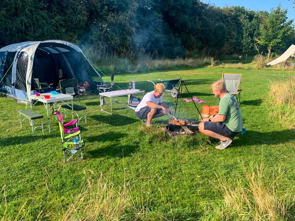 camping near york - camping field and tent