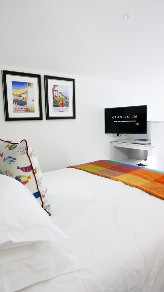 beachcroft-beach-huts: bedroom and TV beachcroft-beach-huts: bedroom and TV