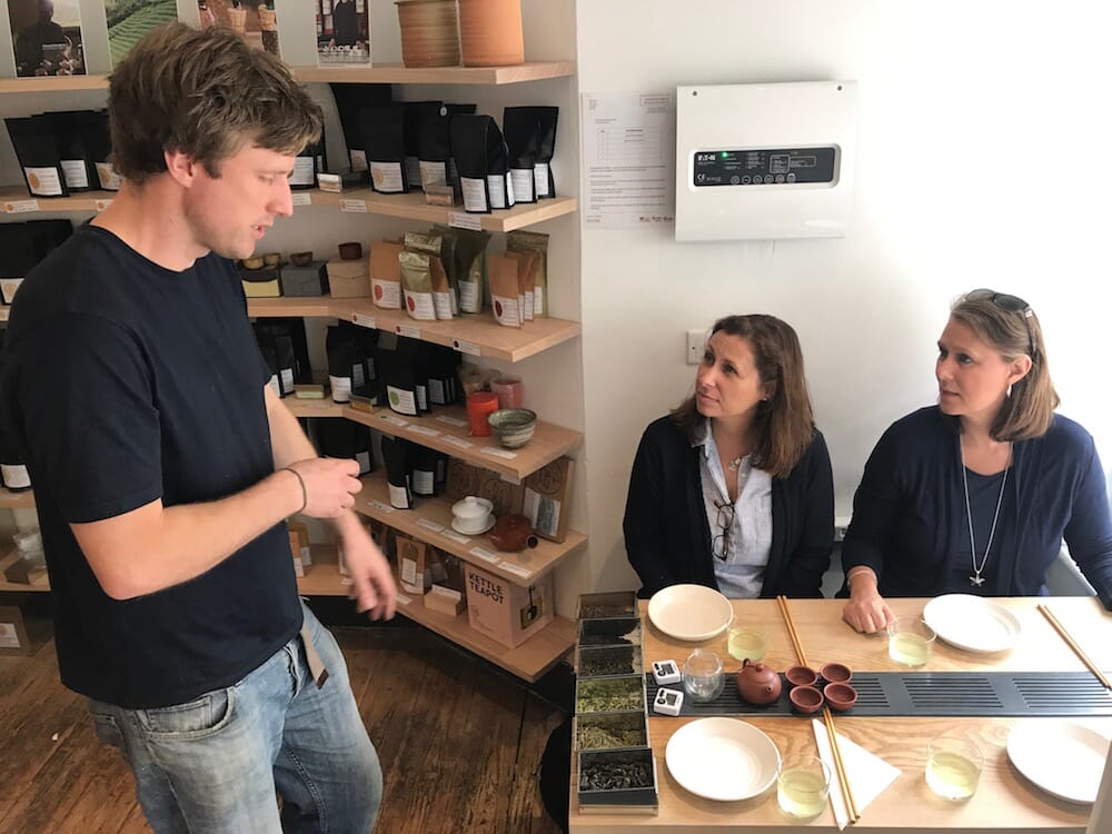 savouring bath walking food tour: guests in shop