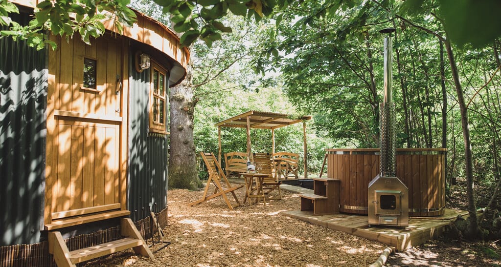 glamping sussex- the roundhouse exterior and woods glamping sussex- the roundhouse exterior and woods
