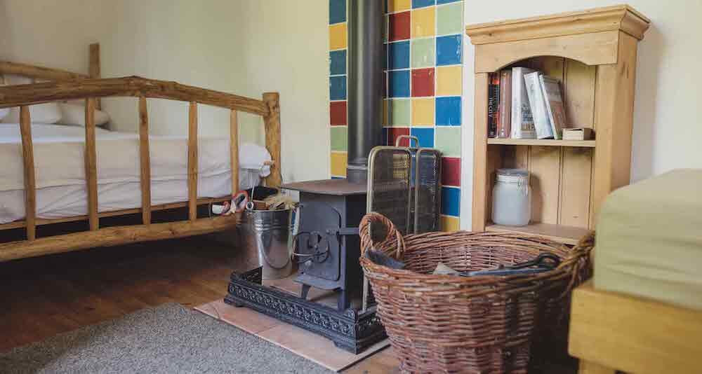 East Sussex Glamping Cottage Sleeping - log burner