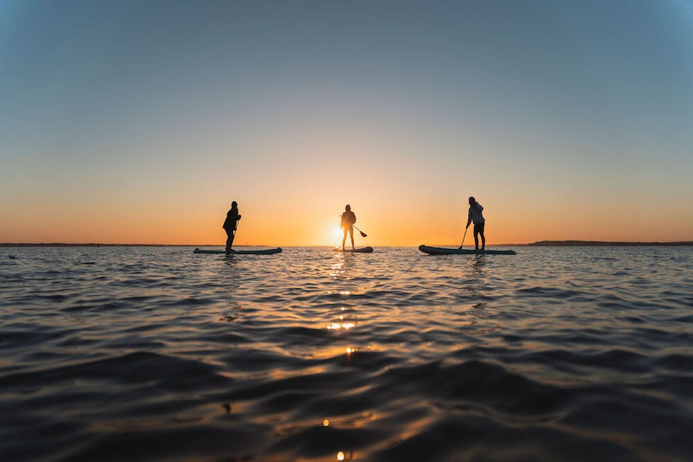 The Wild Times yoga and sup retreats - sup boarding at sunset