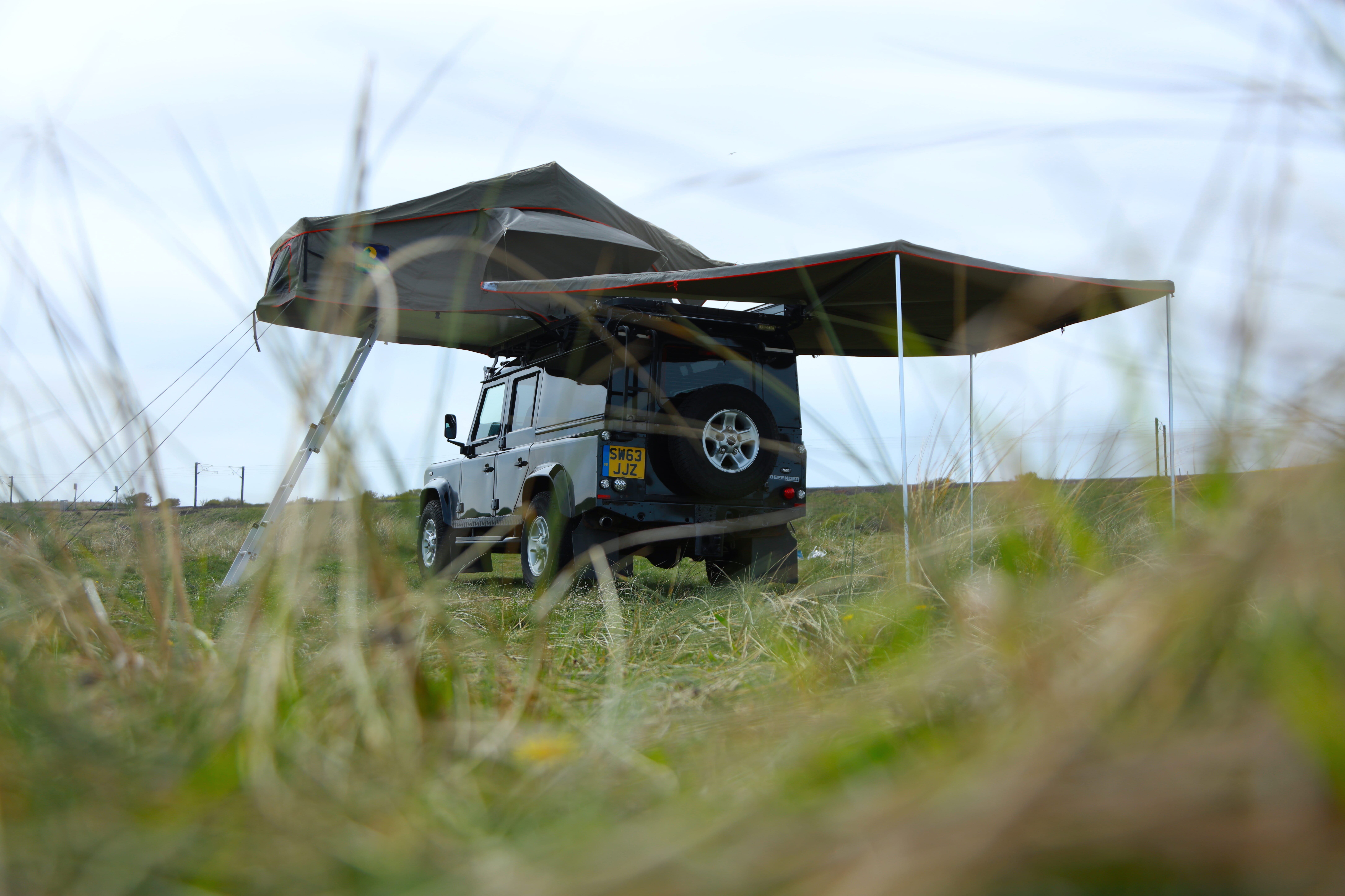 landrover defender camping tent set-up from back
