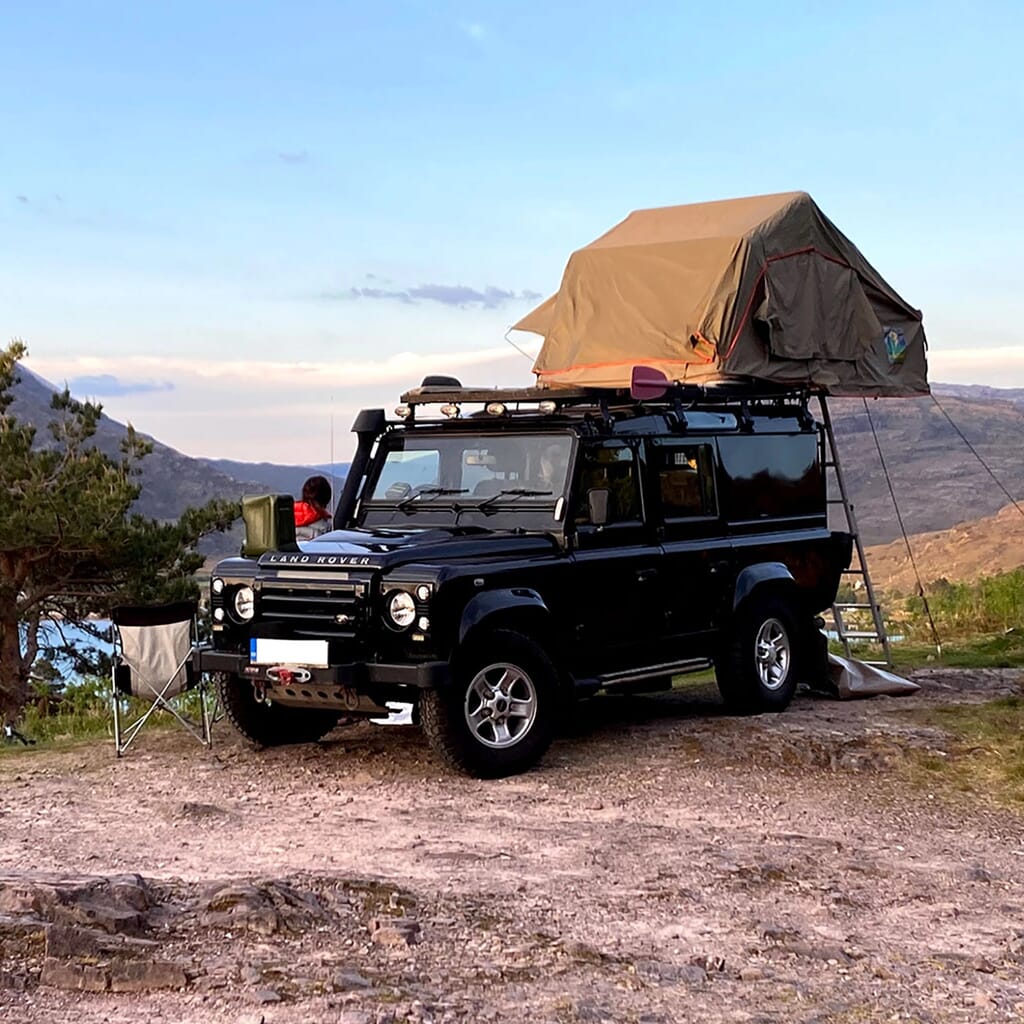 landrover defender camping tent set-up on beach landrover defender camping tent set-up on beach