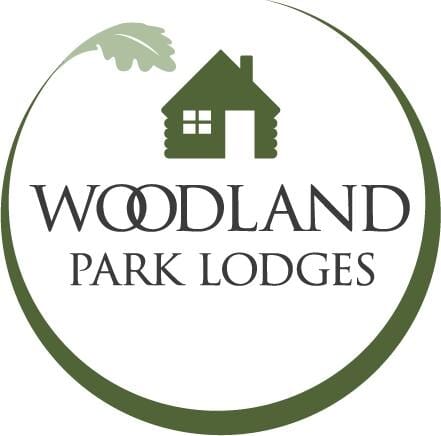 woodland park lodges dog-friendly treehouses: logo