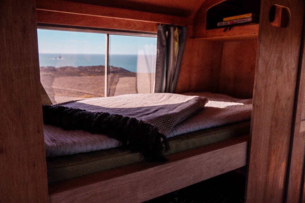 adventure holiday in cornwall: scaranger bus bed inside