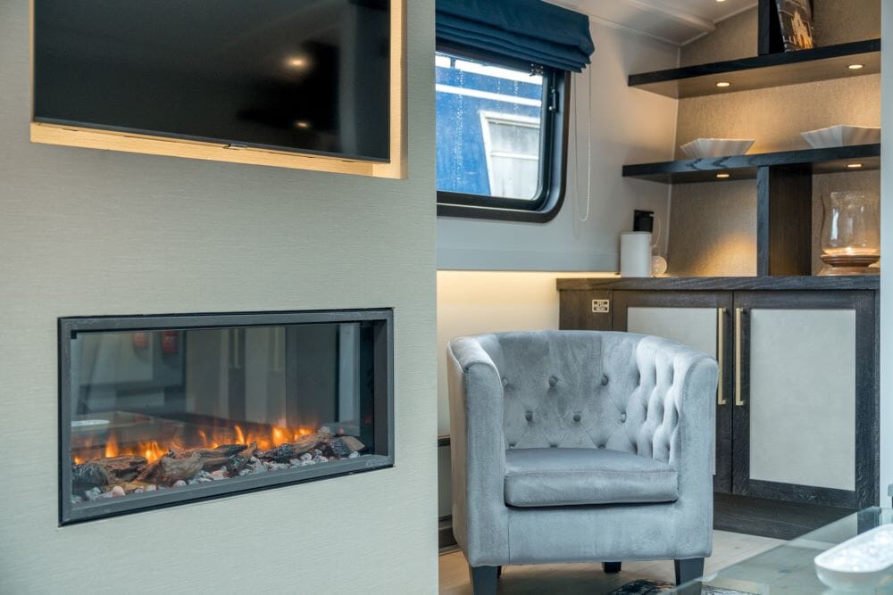 Lulubelle luxury houseboat stay in London Limehouse Marina - interior fireplace