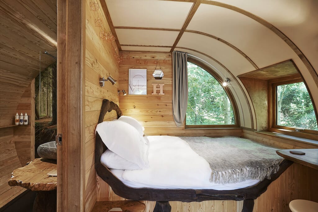 The Hideaway Treehouse at Pickwell Manor in Devon - bedroom