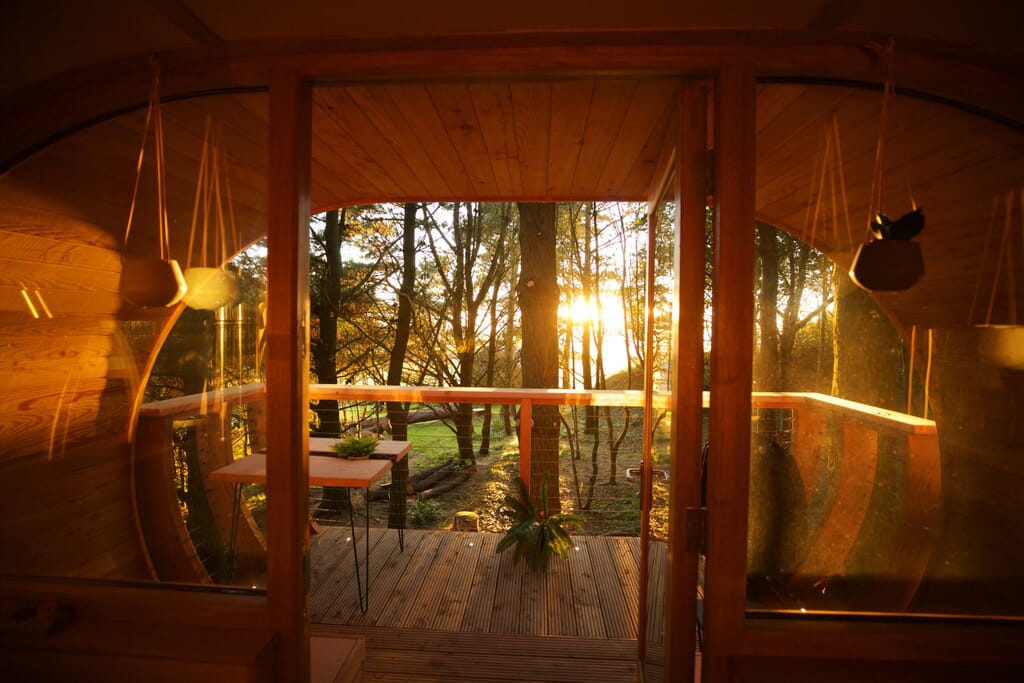 The Loft Treehouse at Pickwell Manor in Devon - at sunset
